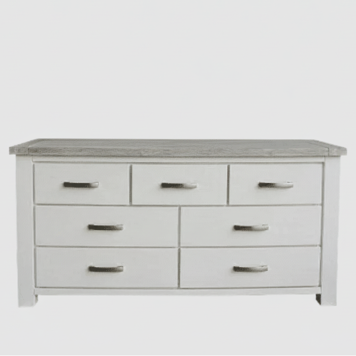 White dresser with multiple drawers on a white background