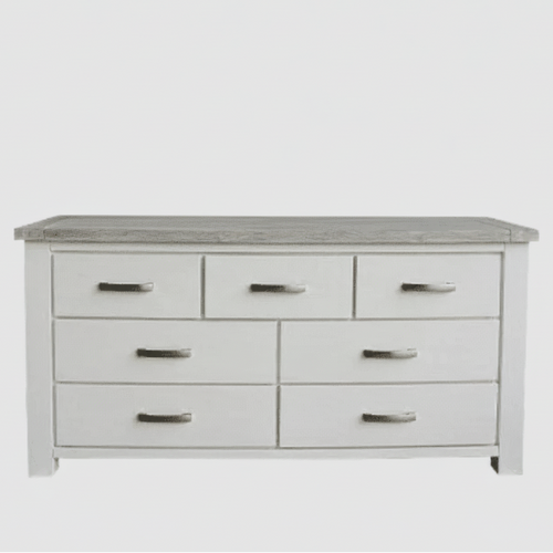White dresser with multiple drawers on a white background